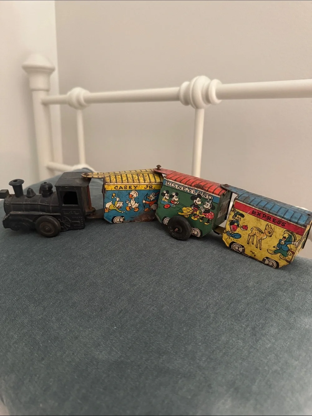 Disney Casey Jr. Toy Train with Yellow, Blue, Red and Black Cars1950s